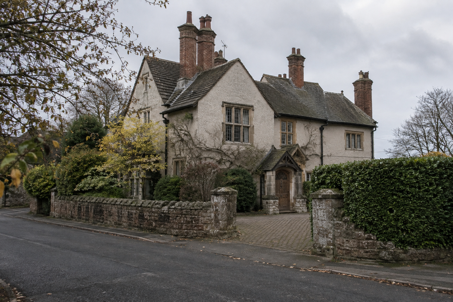 Barn Close on Well Lane in Stanwix, showing the listed house and its architectural details.