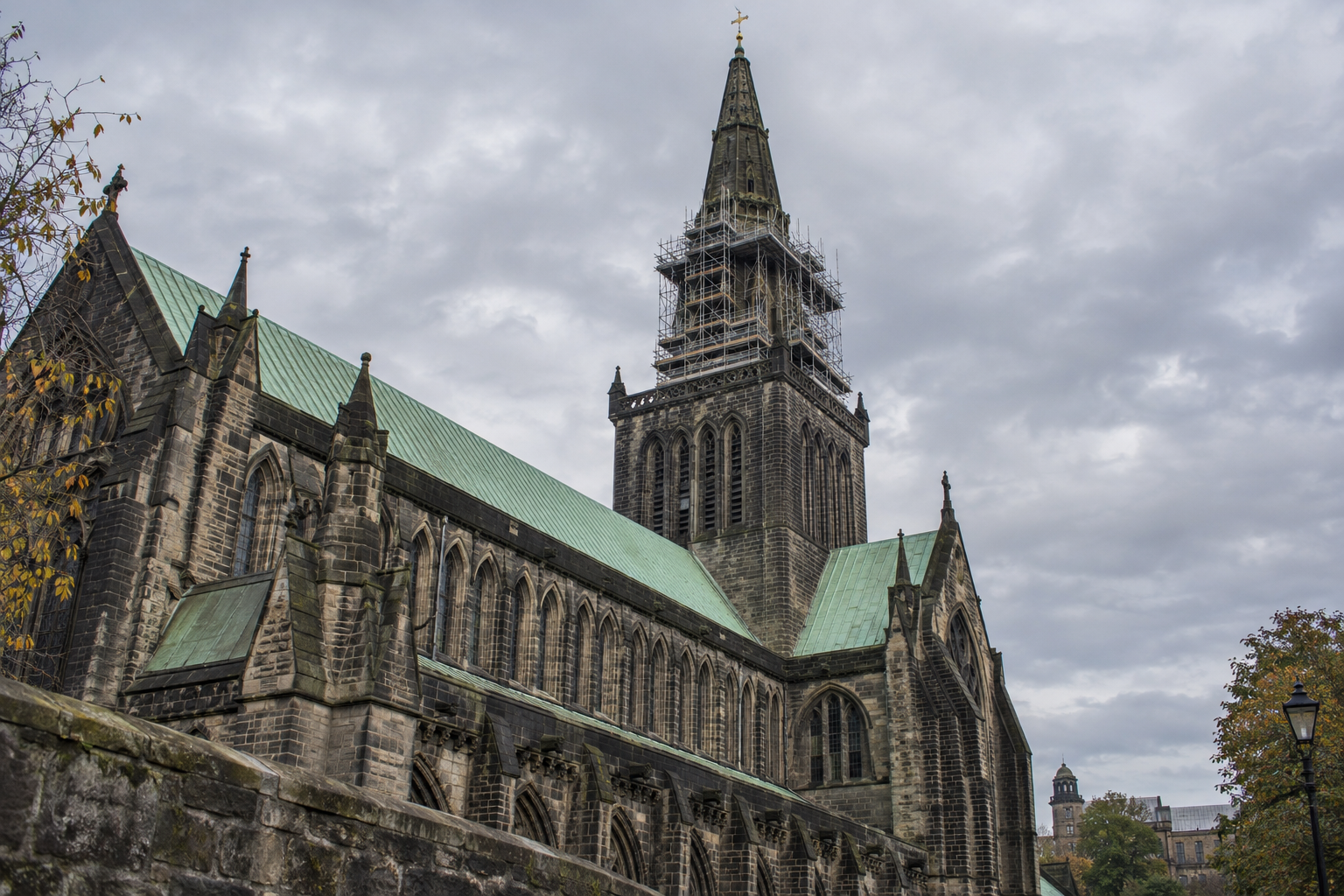Glasgow Cathedral spire repairs with scaffolding surrounding the upper stonework above the medieval cathedral roof.